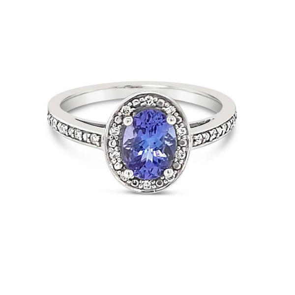 0.76ct Tanzanite & Diamond Halo Ring in 9ct White Gold