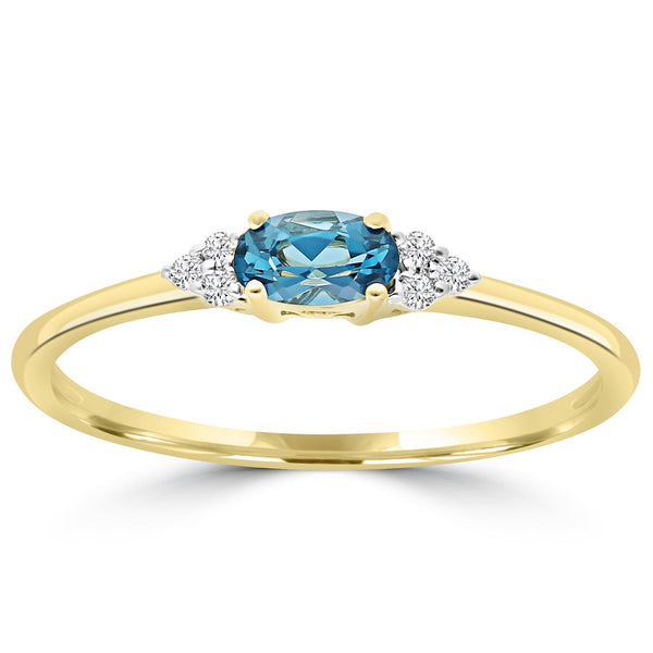 0.03ct HI I1 Diamond and London Blue Topaz Ring in 9ct Yellow Gold